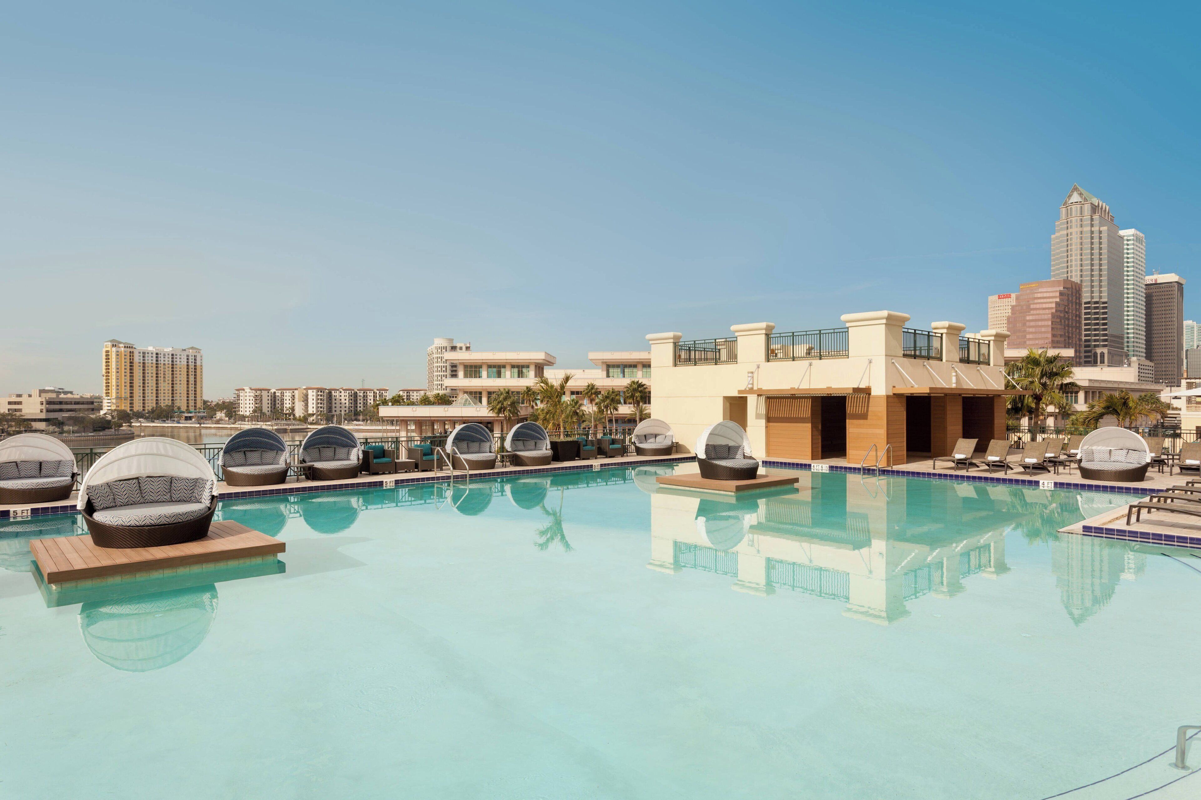 Outdoor pool, open 6:00 AM to 10:00 PM, pool cabanas (surcharge)