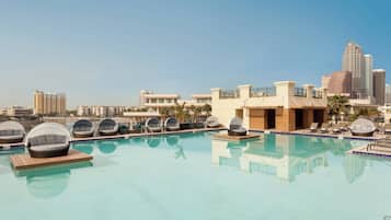 Outdoor pool, open 6:00 AM to 10:00 PM, pool cabanas (surcharge)