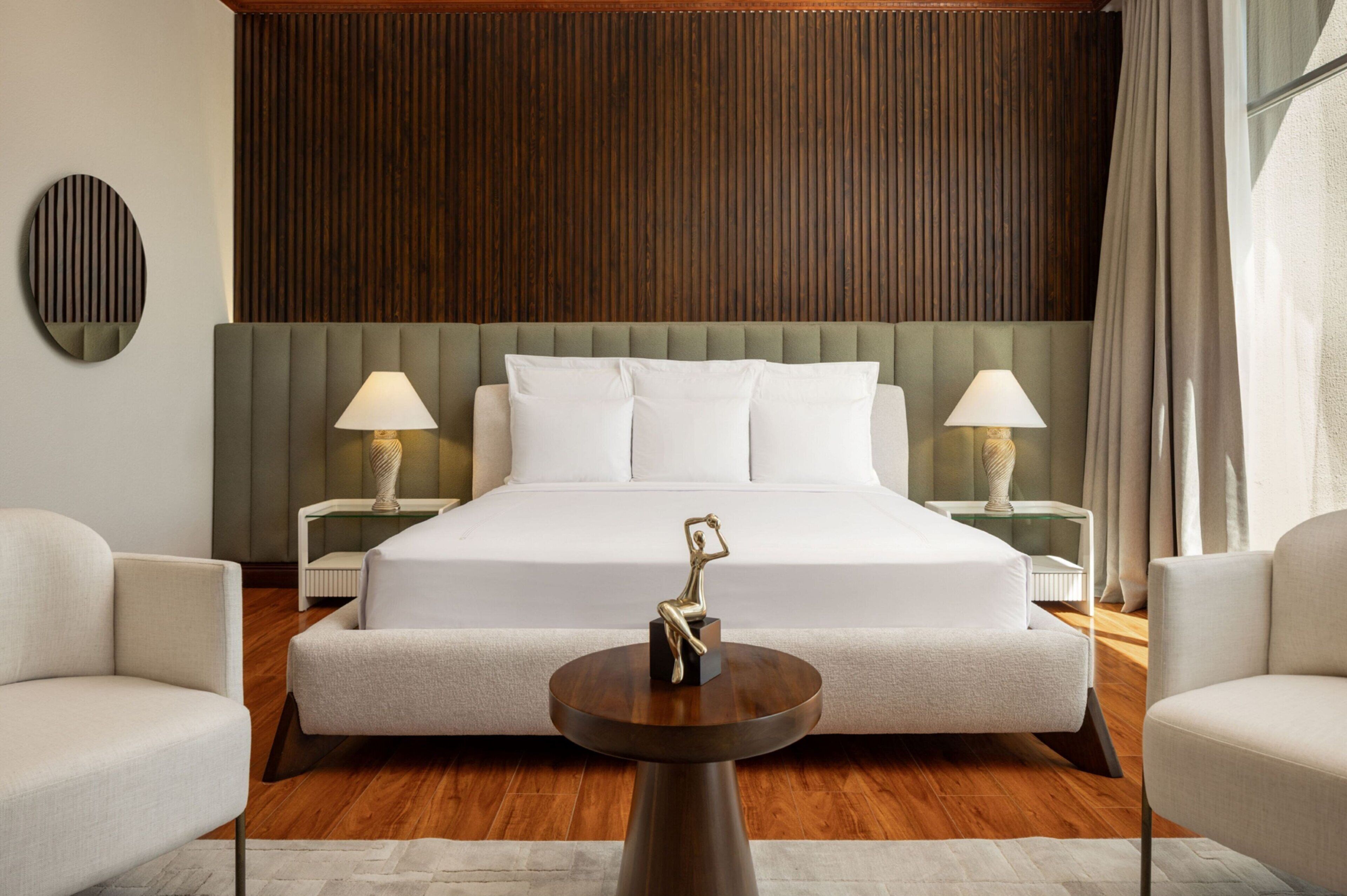 premium bedding, down duvets, minibar, in-room safe