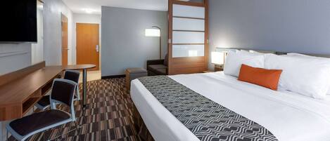 Suite, 1 King Bed, Non Smoking | Desk, laptop workspace, blackout drapes, soundproofing