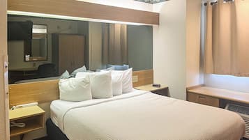 Down duvets, desk, laptop workspace, iron/ironing board