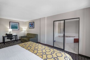 Deluxe Studio Suite, 1 King Bed, Non Smoking | Desk, laptop workspace, iron/ironing board, free cribs/infant beds