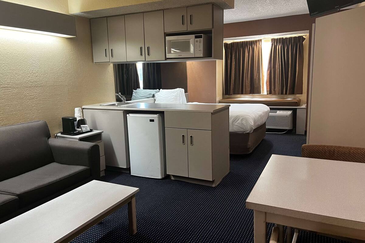 Desk, laptop workspace, cribs (free), rollaway beds (free)
