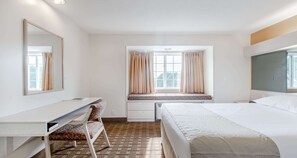 Desk, laptop workspace, blackout curtains, iron/ironing board