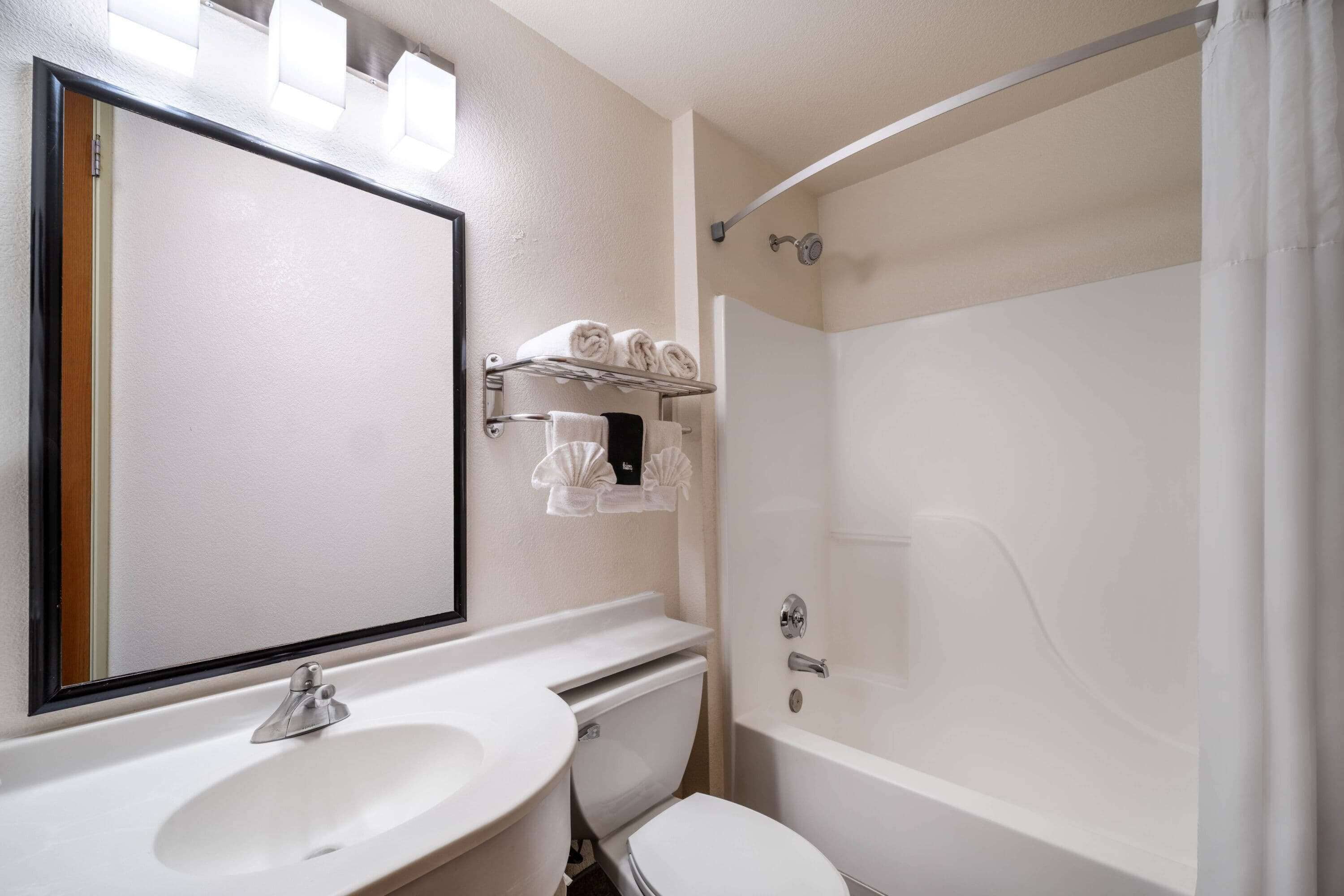 combined shower/bathtub, deep-soaking bathtub, rainfall showerhead