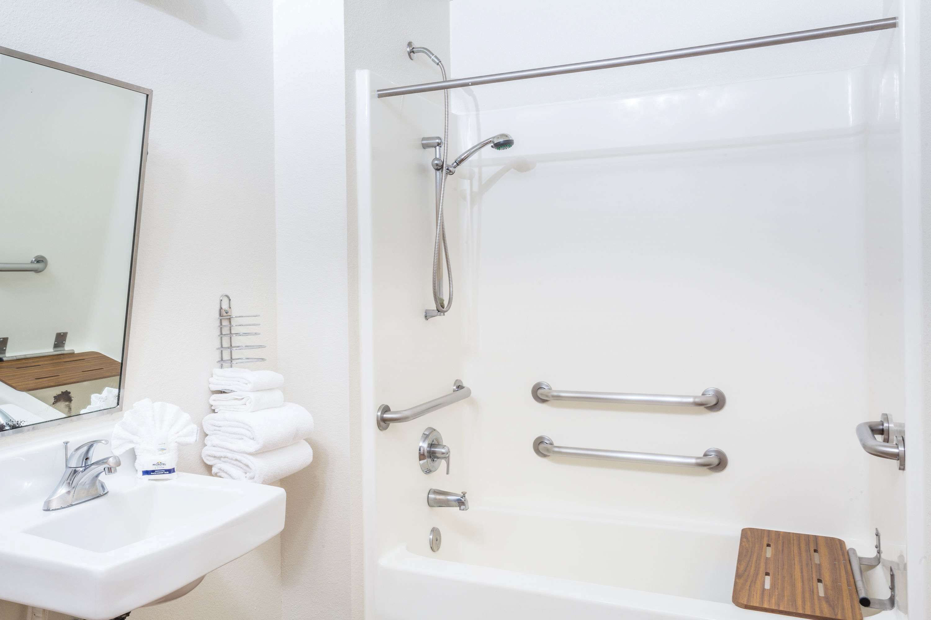 combined shower/bathtub, deep-soaking bathtub, rainfall showerhead