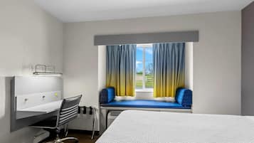 Premium bedding, individually furnished, desk, laptop workspace