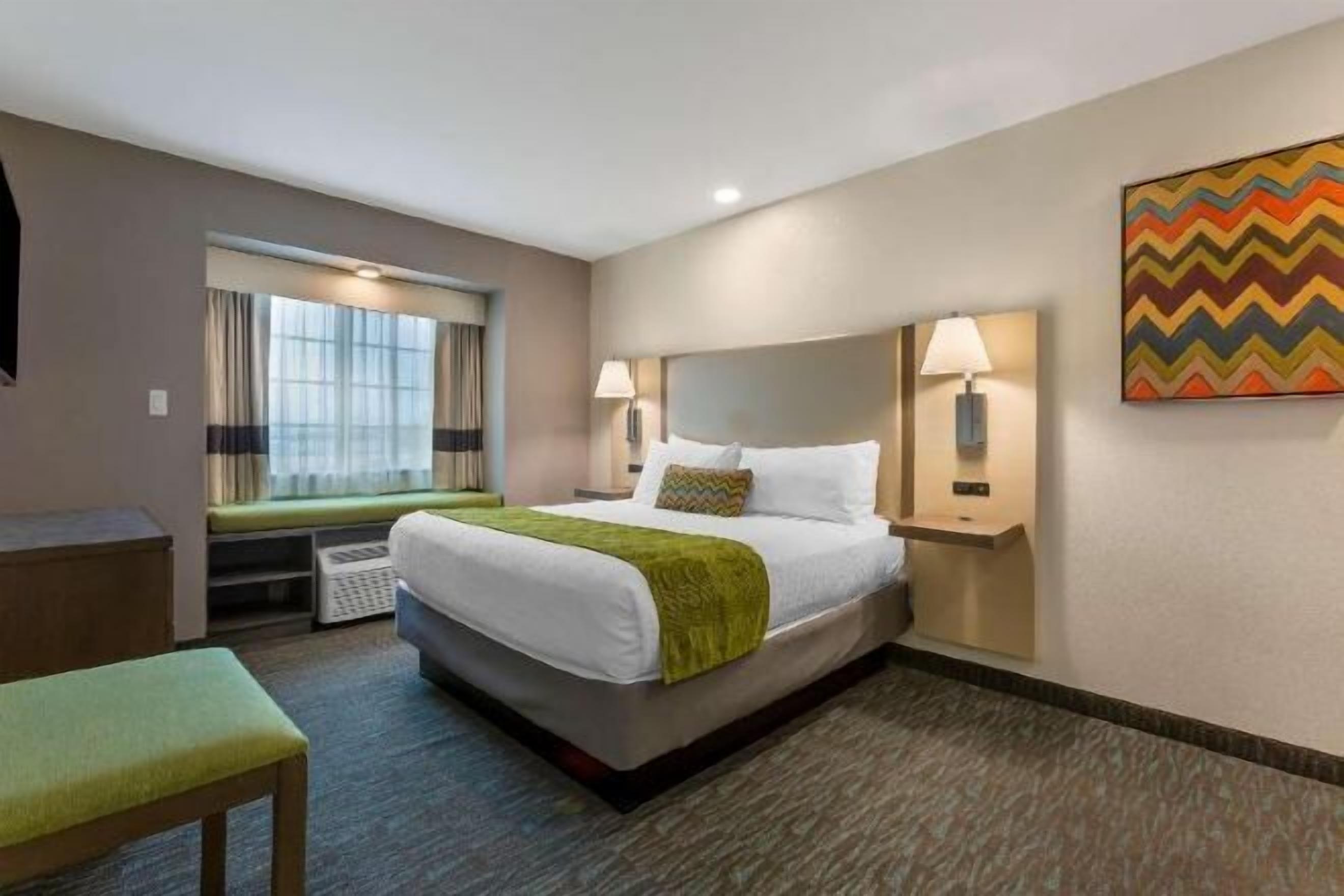 Desk, laptop workspace, iron/ironing board, free cots/infant beds