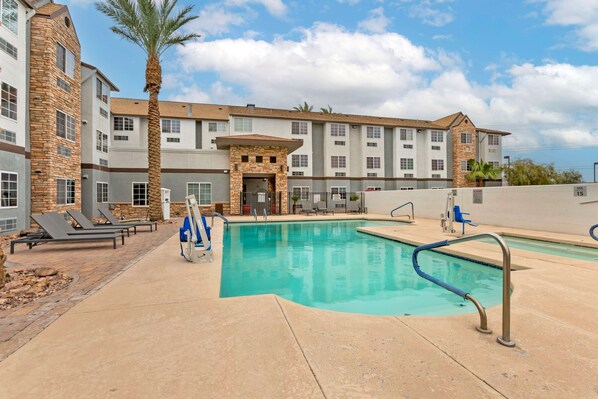 Outdoor pool, open 9:00 AM to 10:00 PM, pool umbrellas, sun loungers
