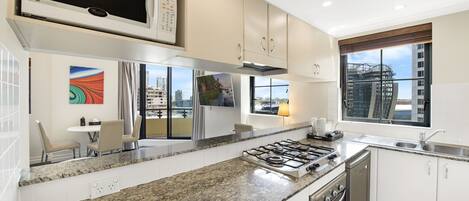 Two Bedroom Executive Apartment | Private kitchenette | Mini-fridge, coffee/tea maker, electric kettle