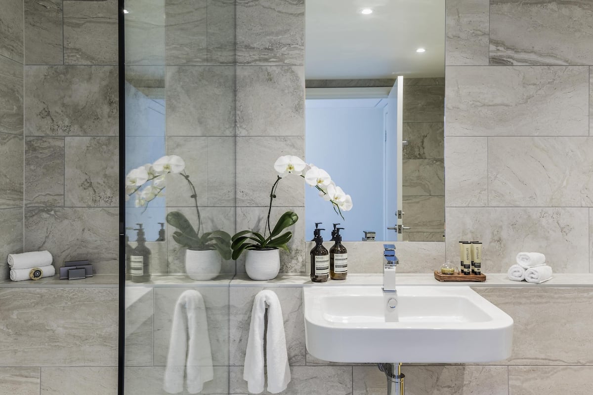 Premium bedding, down comforters, in-room safe, laptop workspace