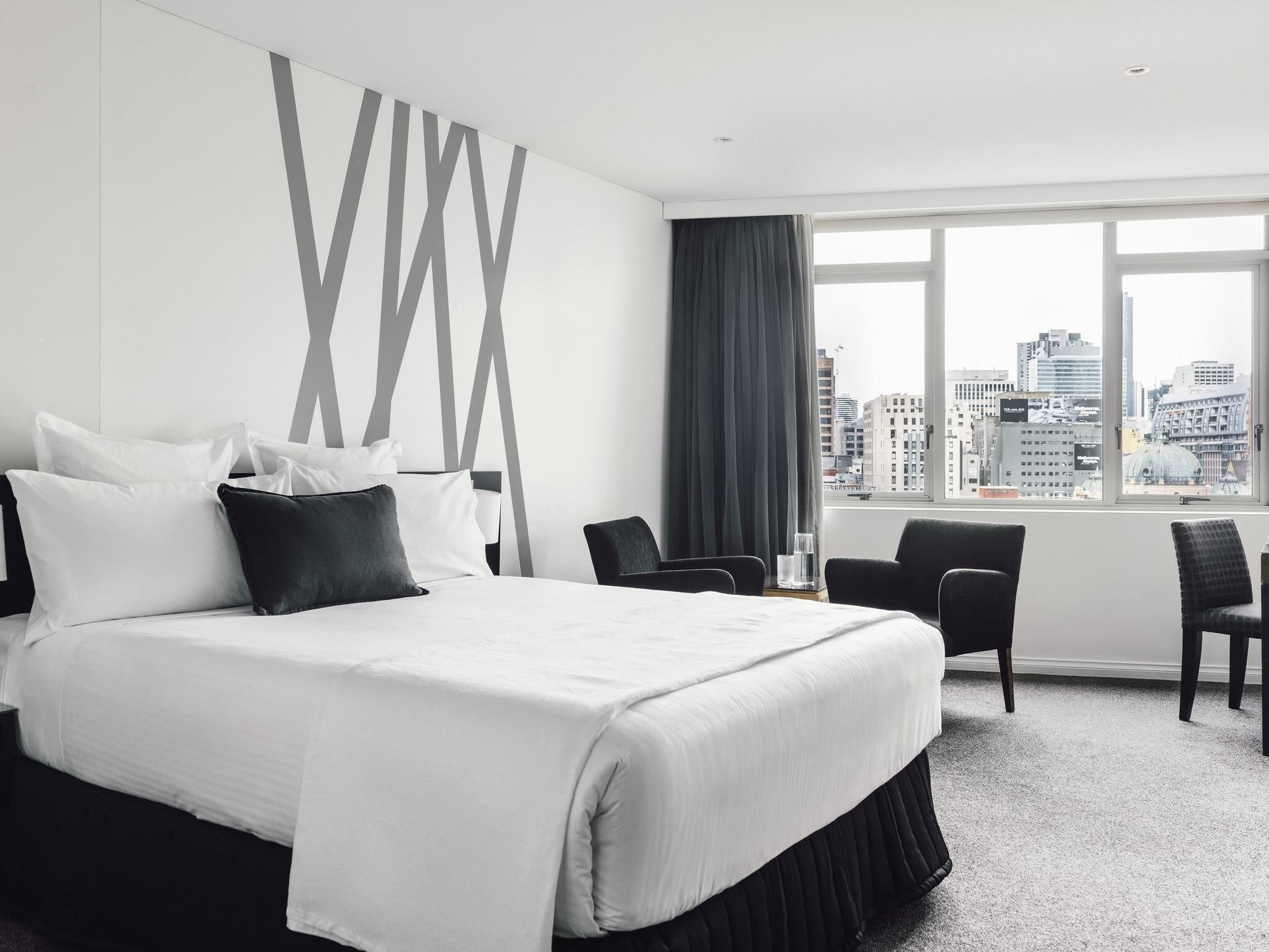 Premium bedding, down comforters, in-room safe, laptop workspace