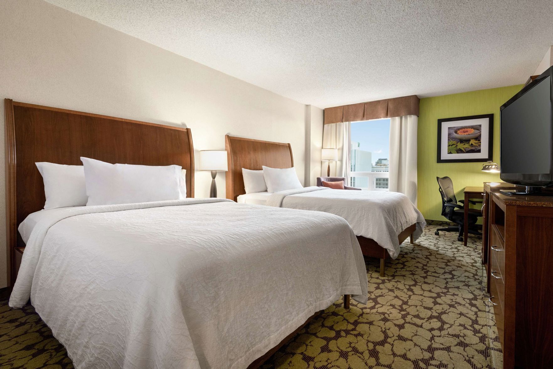 Premium bedding, down comforters, pillowtop beds, in-room safe