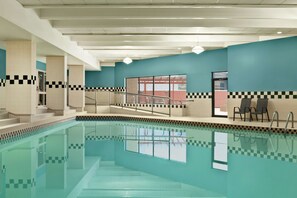 Indoor pool, open 9:00 AM to 10:00 PM, pool loungers