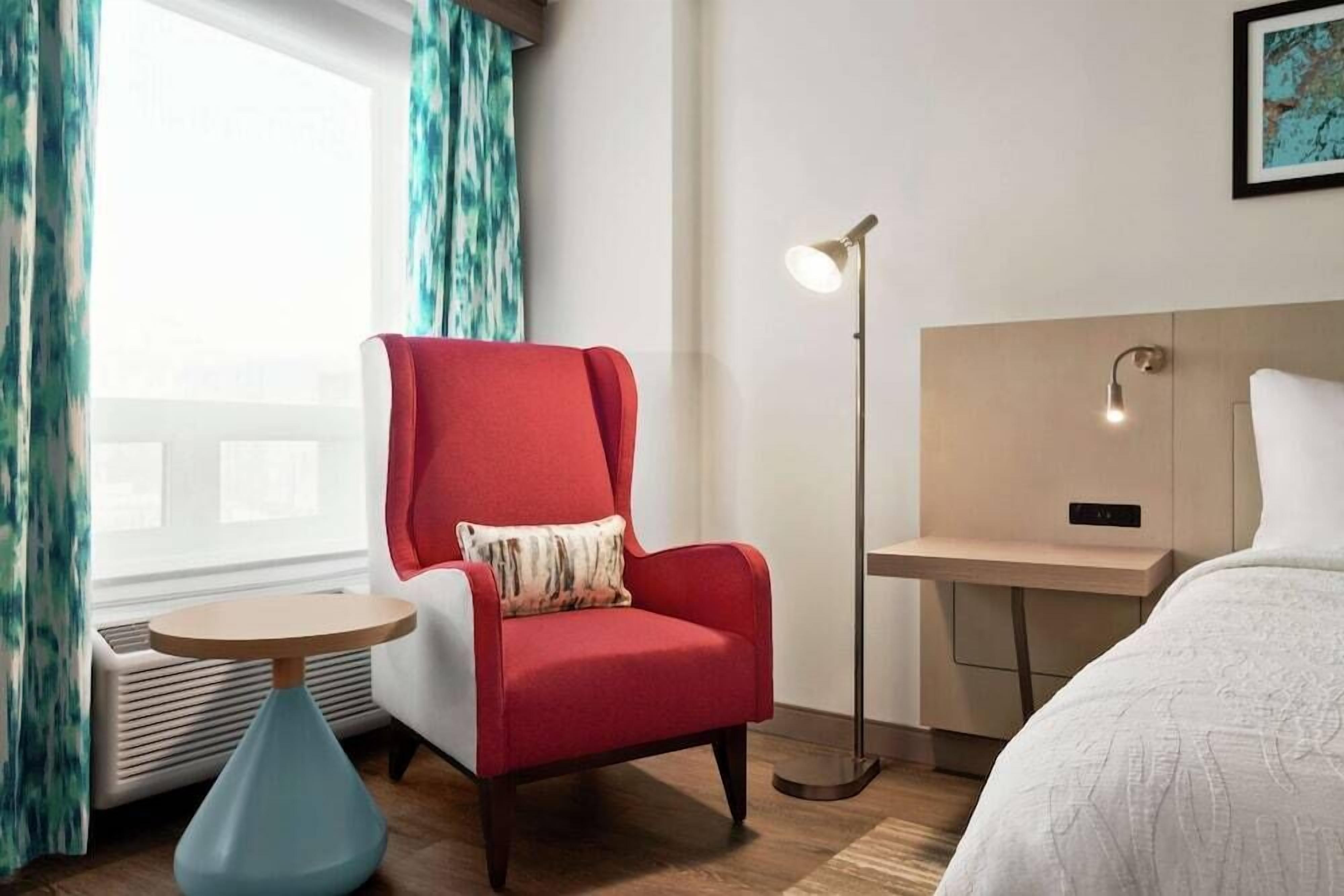 Premium bedding, down comforters, pillowtop beds, in-room safe