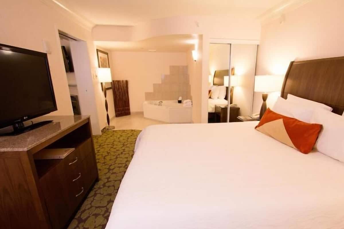 Premium bedding, down duvets, pillow-top beds, in-room safe