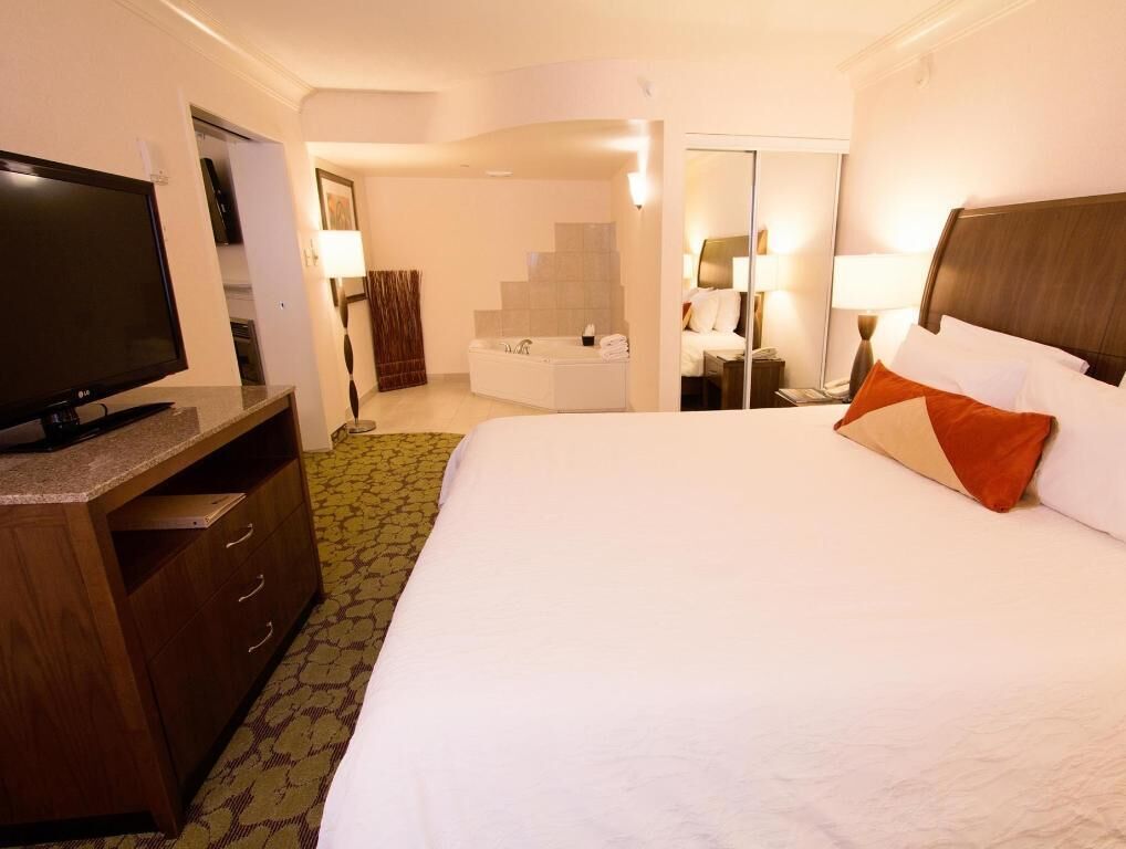 Premium bedding, down duvets, pillow-top beds, in-room safe