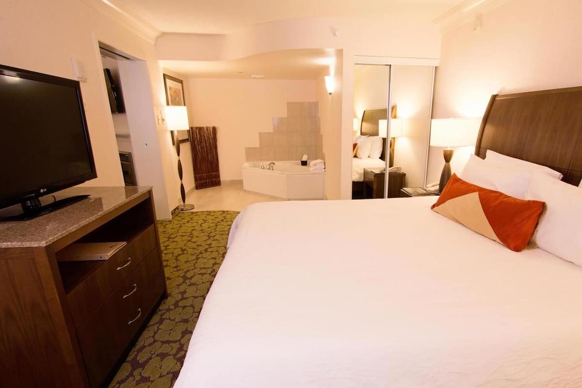 Premium bedding, down comforters, pillowtop beds, in-room safe