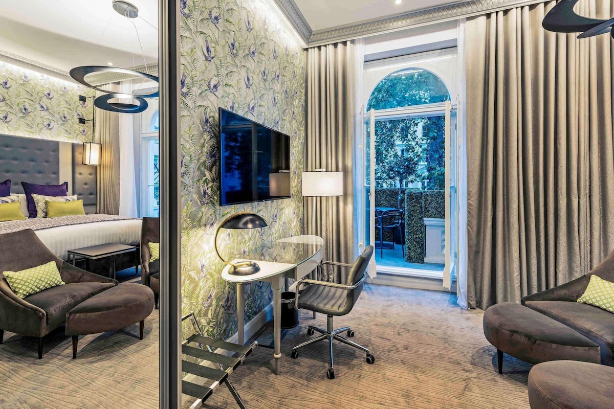 Junior suite, 1 kingsize bed met slaapbank | Een minibar, een kluis op de kamer, individueel gedecoreerd