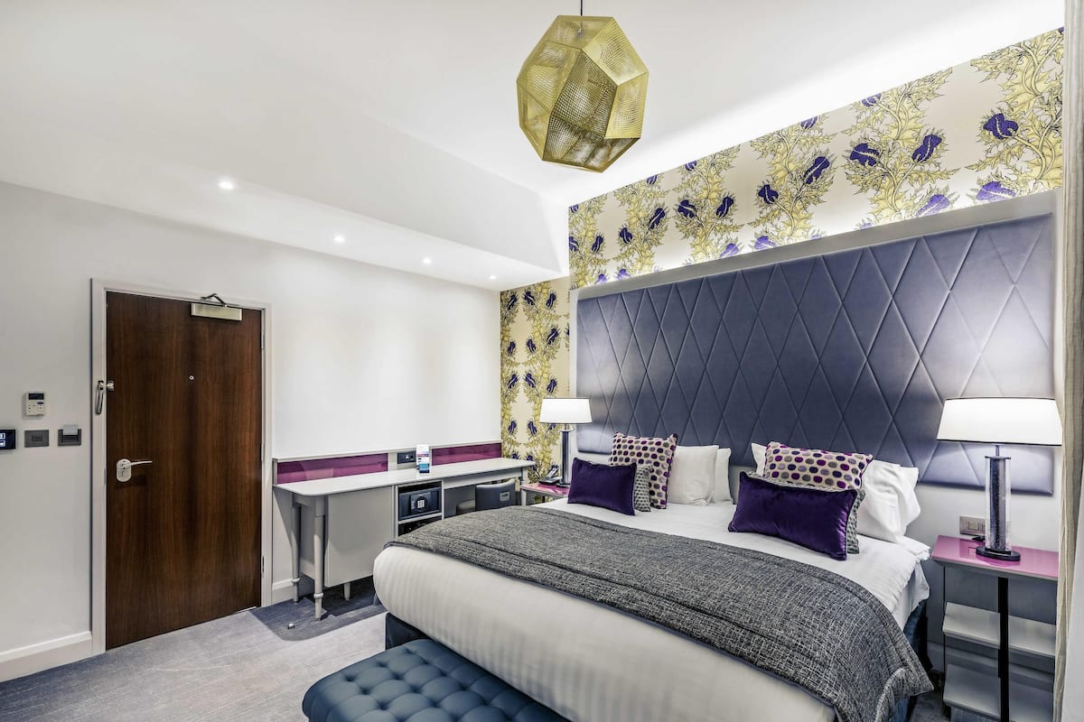 Superior Twin Room | Minibar, in-room safe, individually decorated, individually furnished