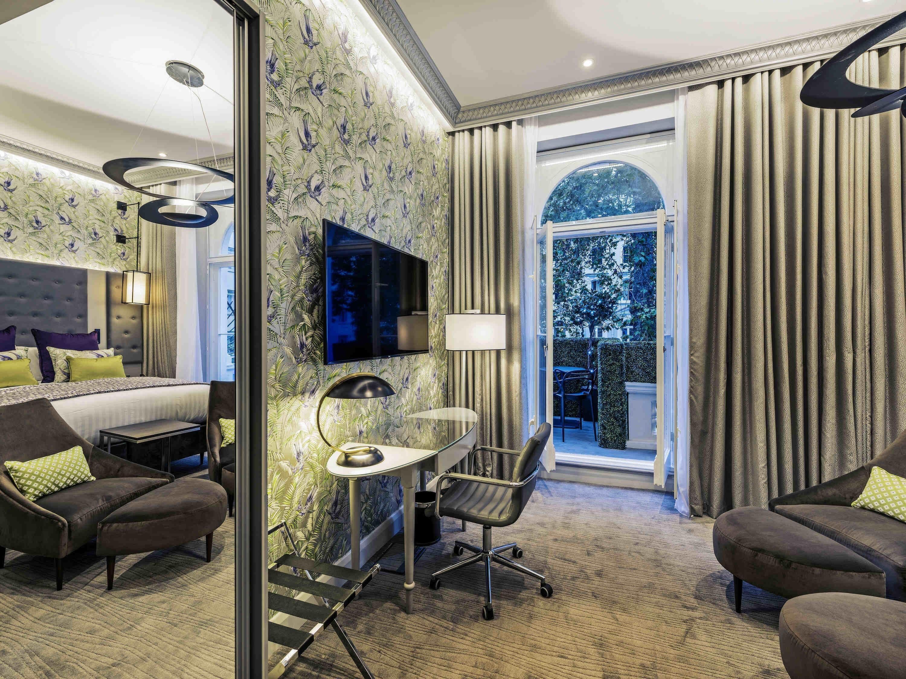 Junior suite, 1 kingsize bed met slaapbank | Een minibar, een kluis op de kamer, individueel gedecoreerd