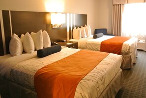 Premium bedding, down comforters, pillowtop beds, in-room safe