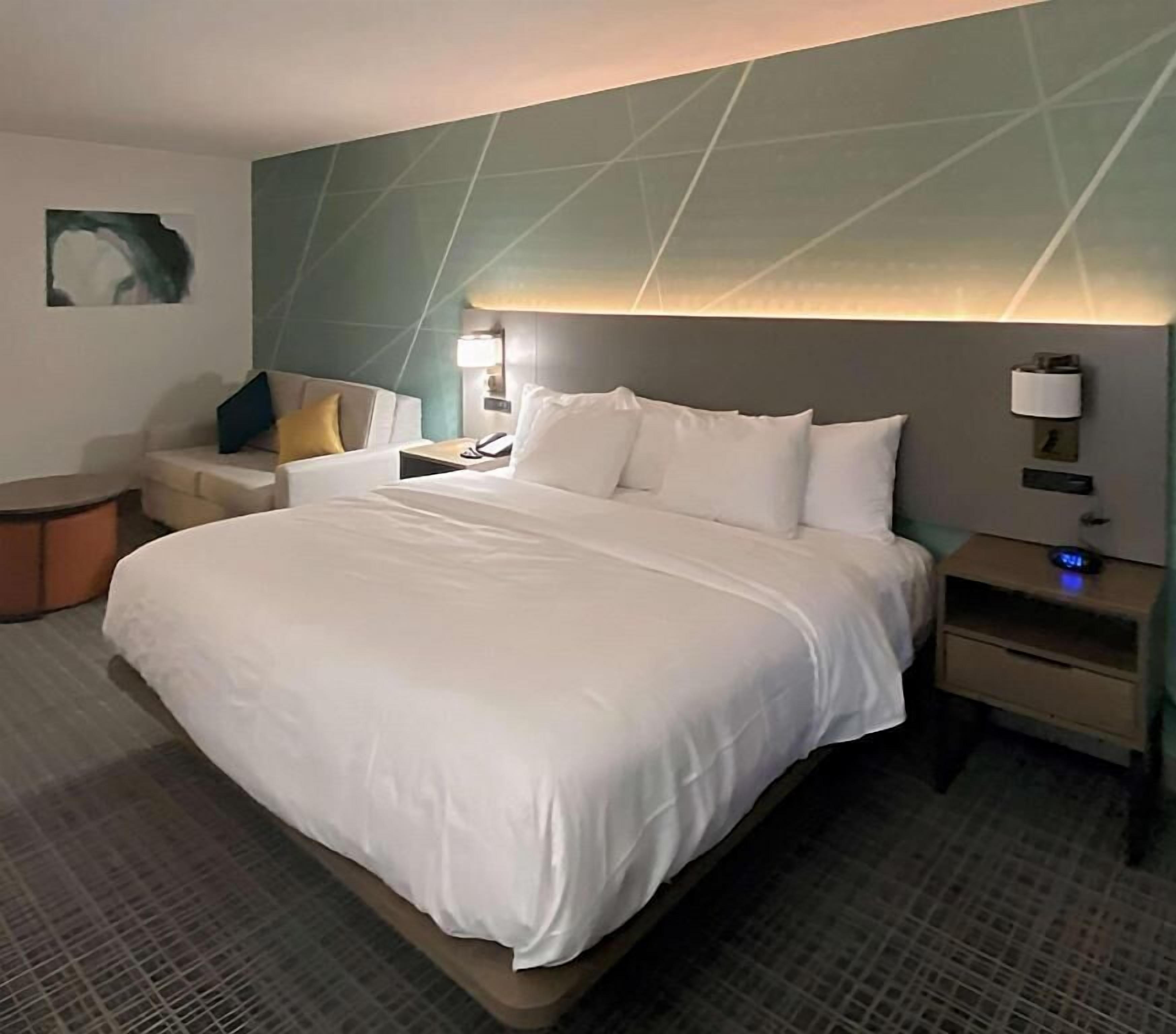 In-room safe, desk, iron/ironing board, free cribs/infant beds