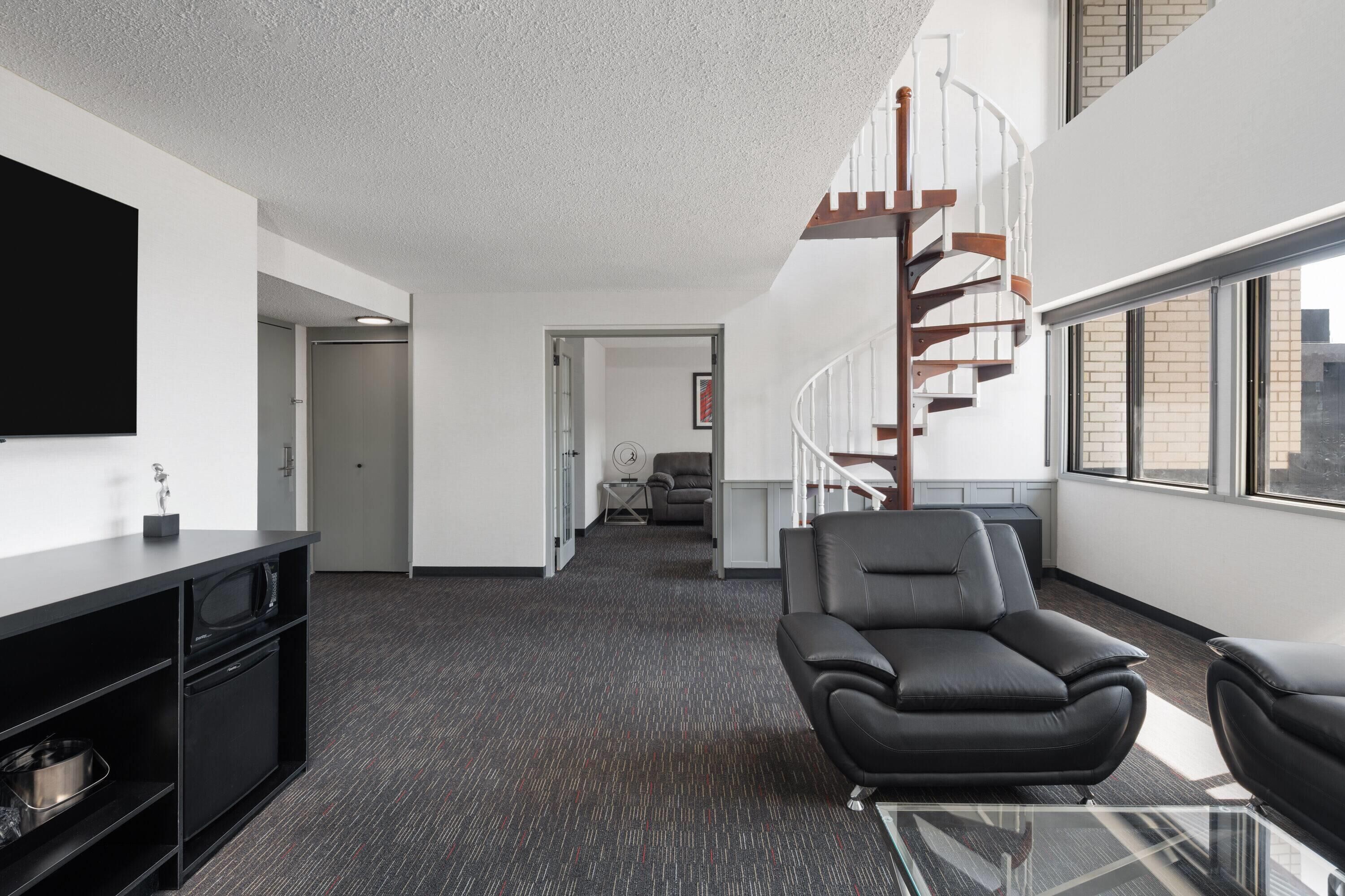 Suíte premier, 1 cama King e sofá-cama (2 Story) | Cofres nos quartos, escrivaninha, espaço de trabalho para notebook