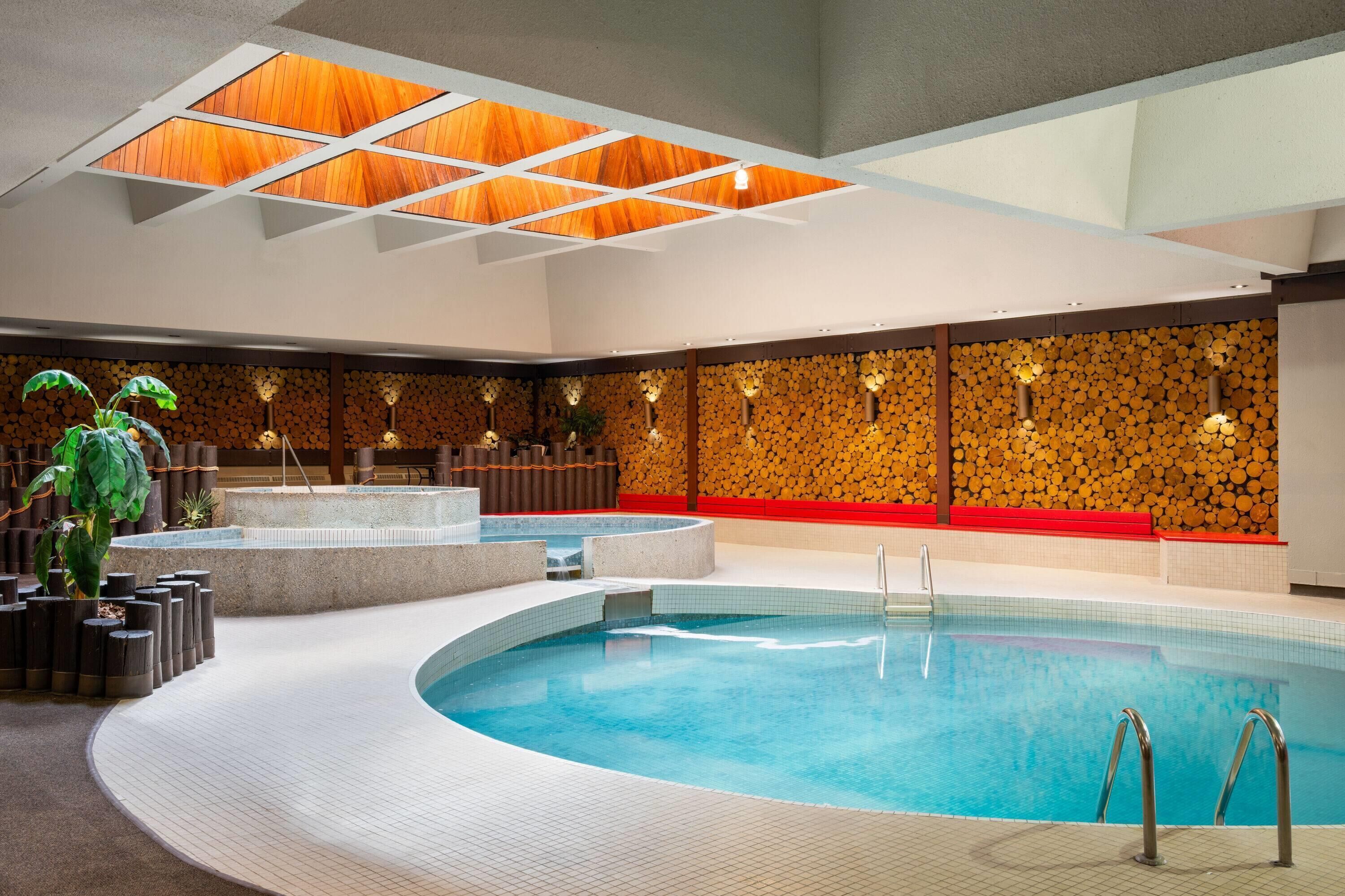 Indoor pool, open 6:00 AM to 10:00 PM, sun loungers