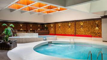 Indoor pool, open 6:00 AM to 10:00 PM, pool loungers