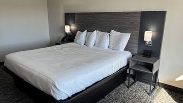 Room, 1 King Bed | Individually furnished, desk, laptop workspace, blackout drapes