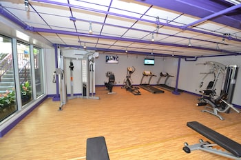 Stay fit on the go with our fully equipped gym featuring treadmills, stationary bikes, and weightlifting equipment. at Sea Club Resort