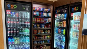 A grab-and-go section with beverage dispensers and snack shelves. - Holiday Inn Express & Suites Chatsworth by IHG (Chatsworth)