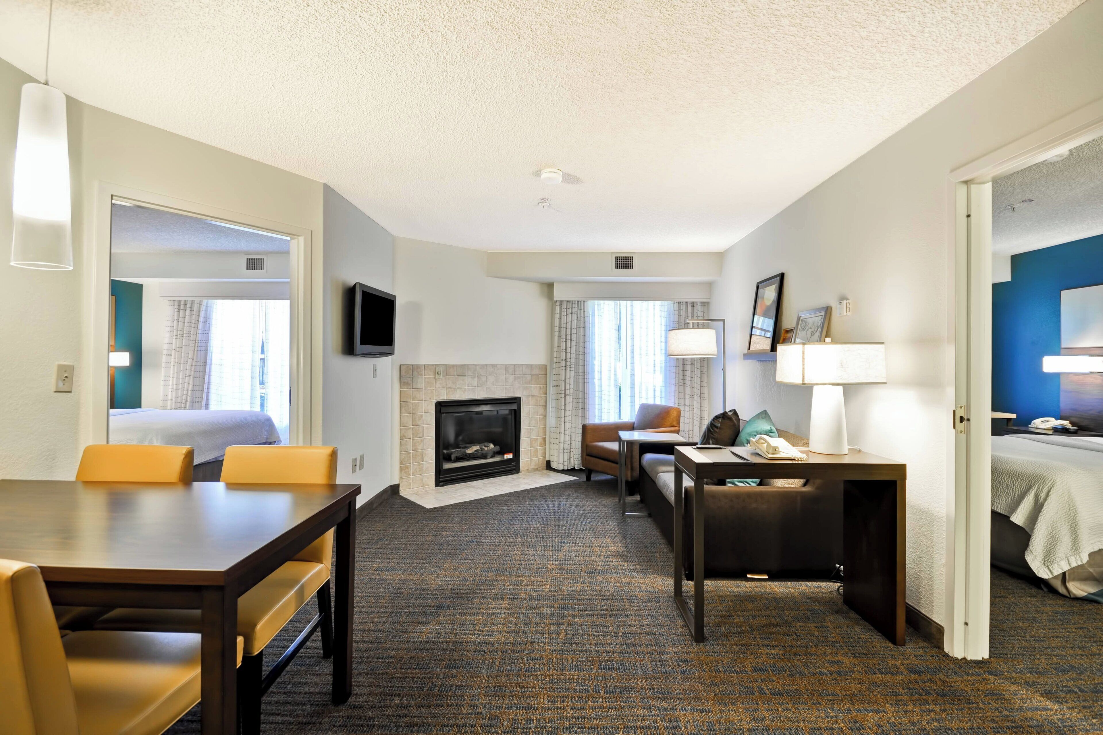 suite, 2 bedrooms, fireplace | premium bedding, desk, soundproofing, iron/ironing board