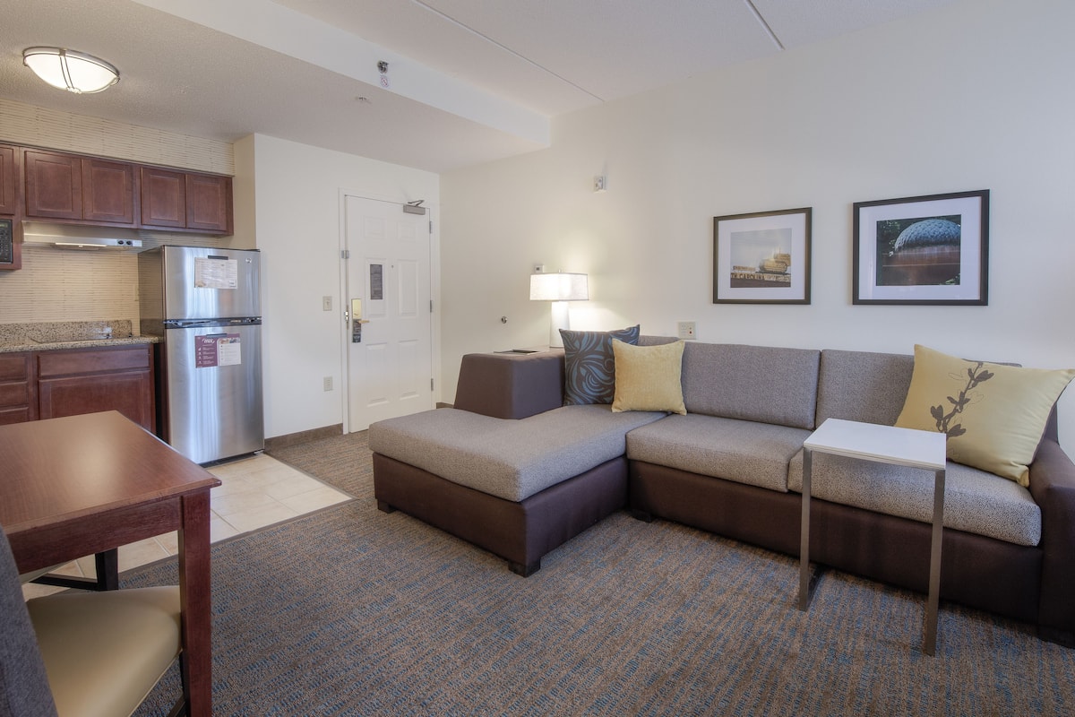 studio, 1 king bed with sofa bed, non smoking | living area | lcd tv