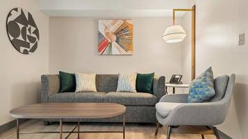 Hypo-allergenic bedding, down comforters, desk, blackout drapes