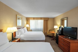 Hypo-allergenic bedding, pillowtop beds, in-room safe, desk