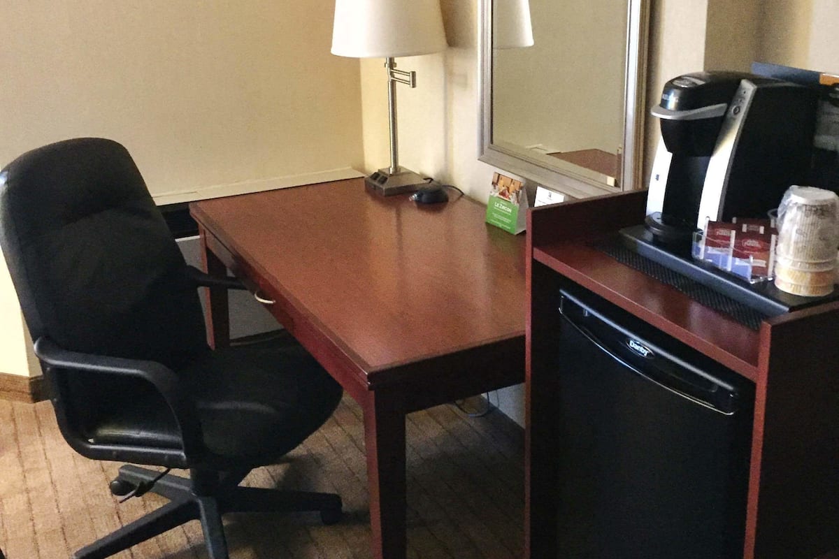 Hypo-allergenic bedding, pillowtop beds, desk, blackout drapes