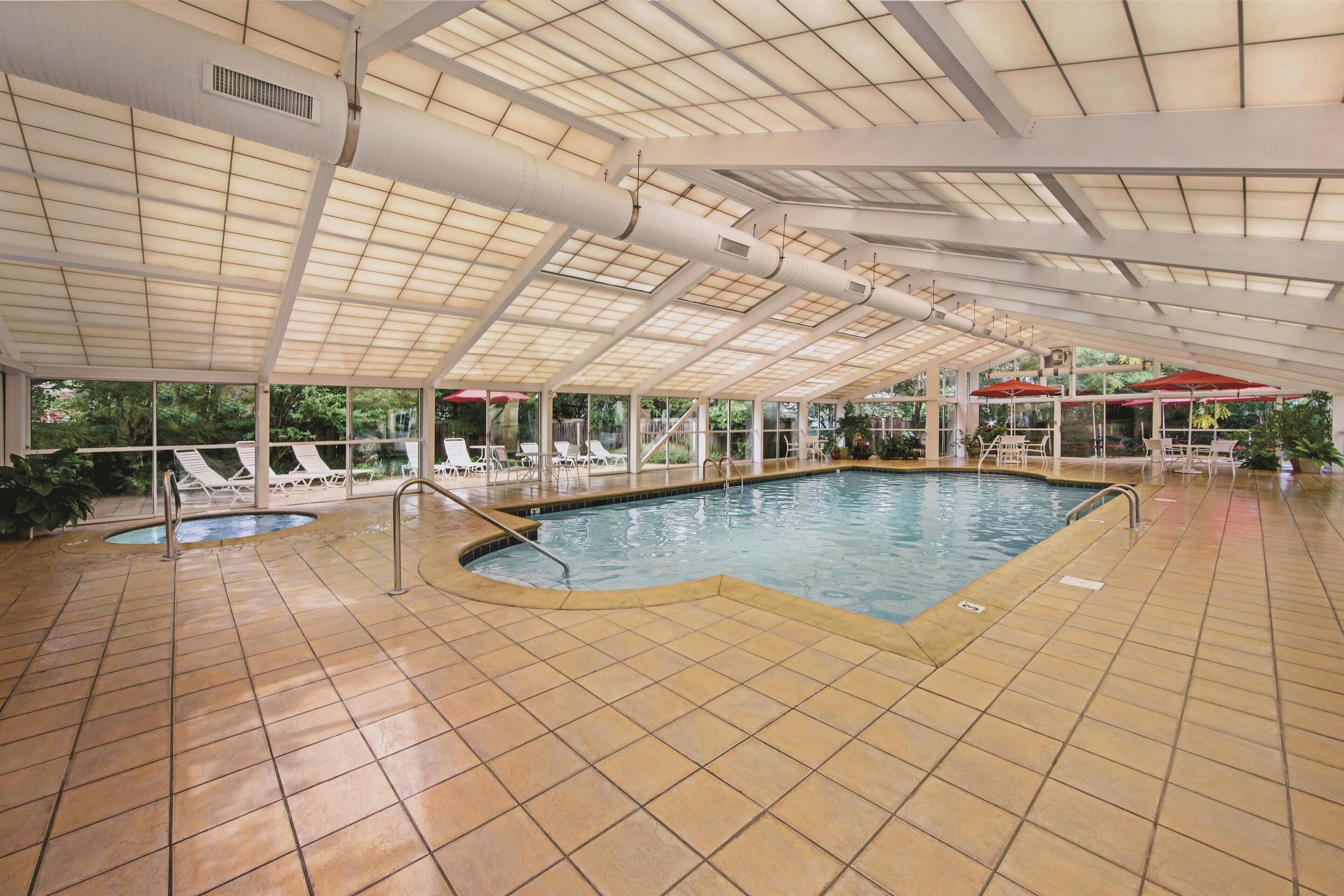 Indoor pool, a heated pool, pool loungers