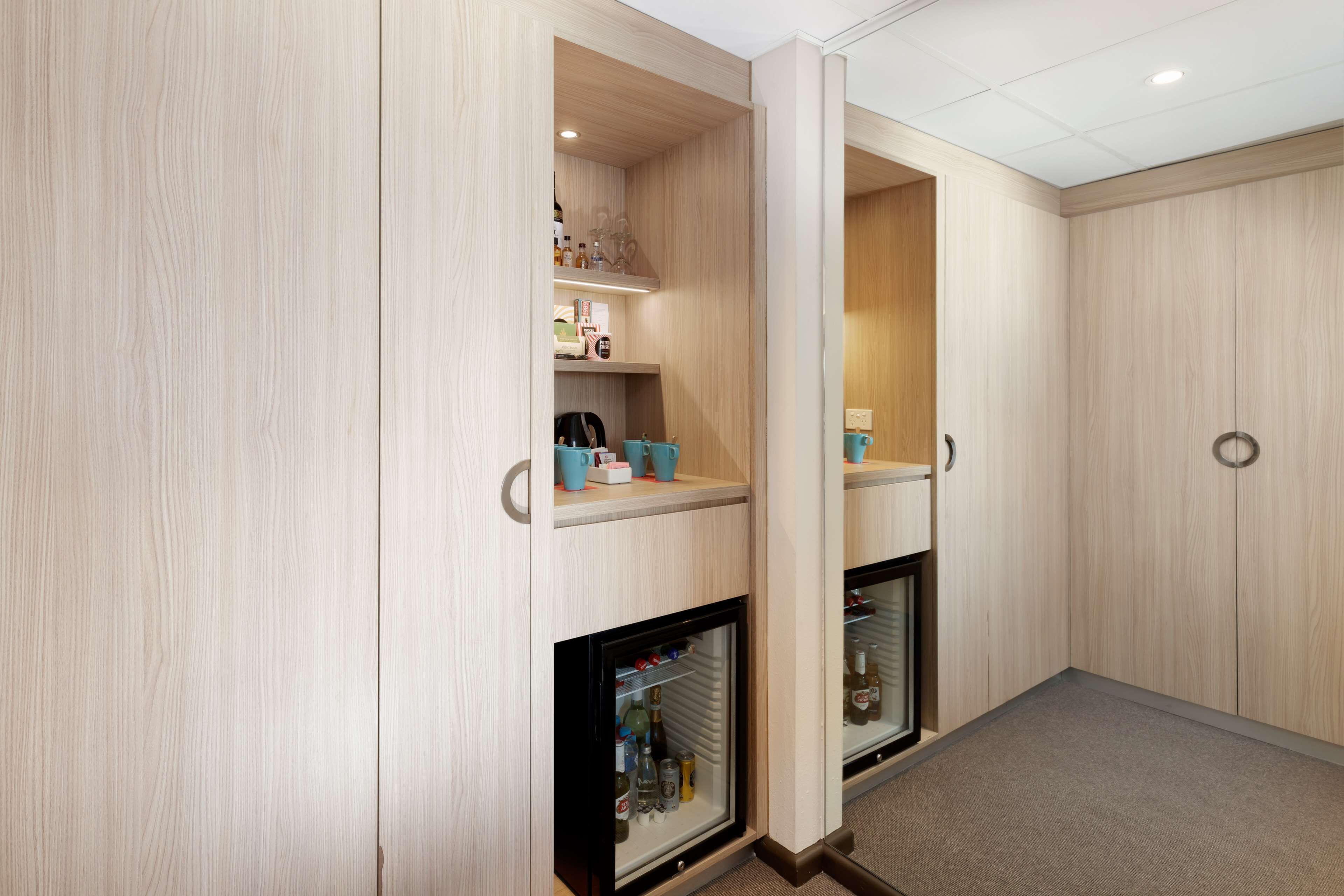 minibar, desk, laptop workspace, blackout curtains