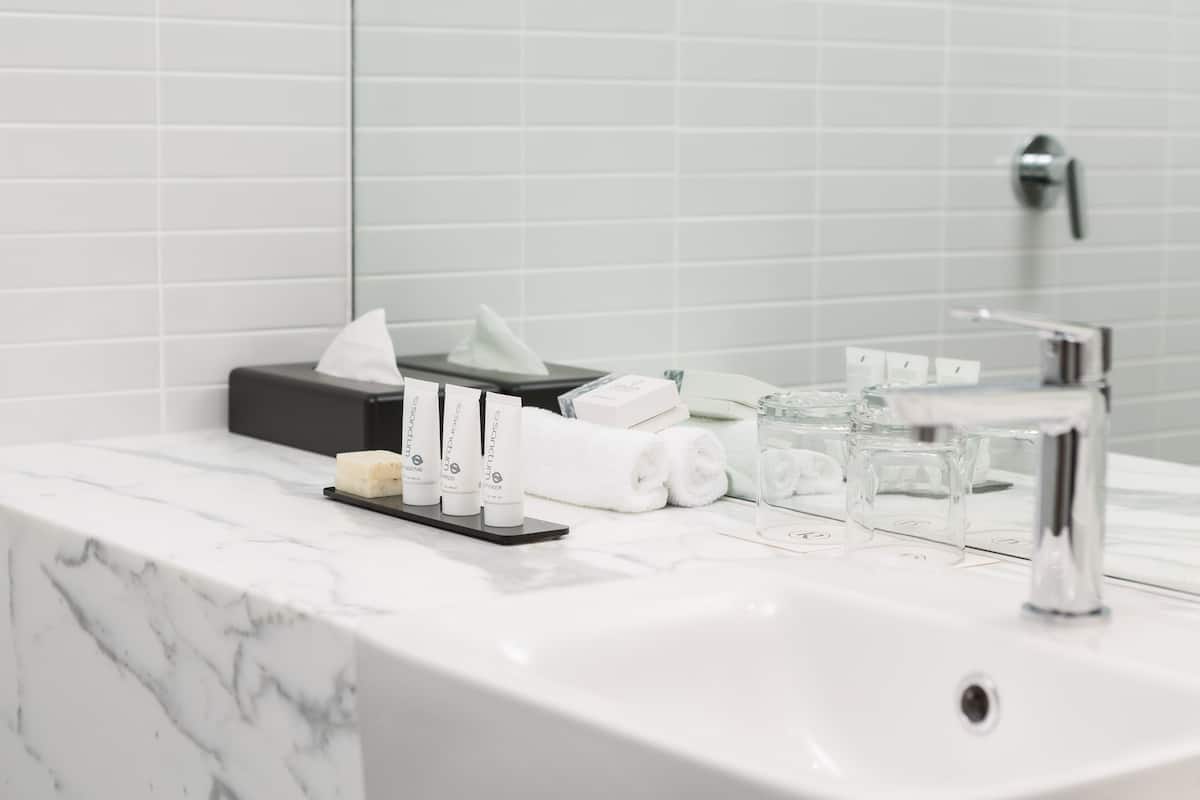 panoramic suite | bathroom | eco-friendly toiletries, hair dryer, towels, soap