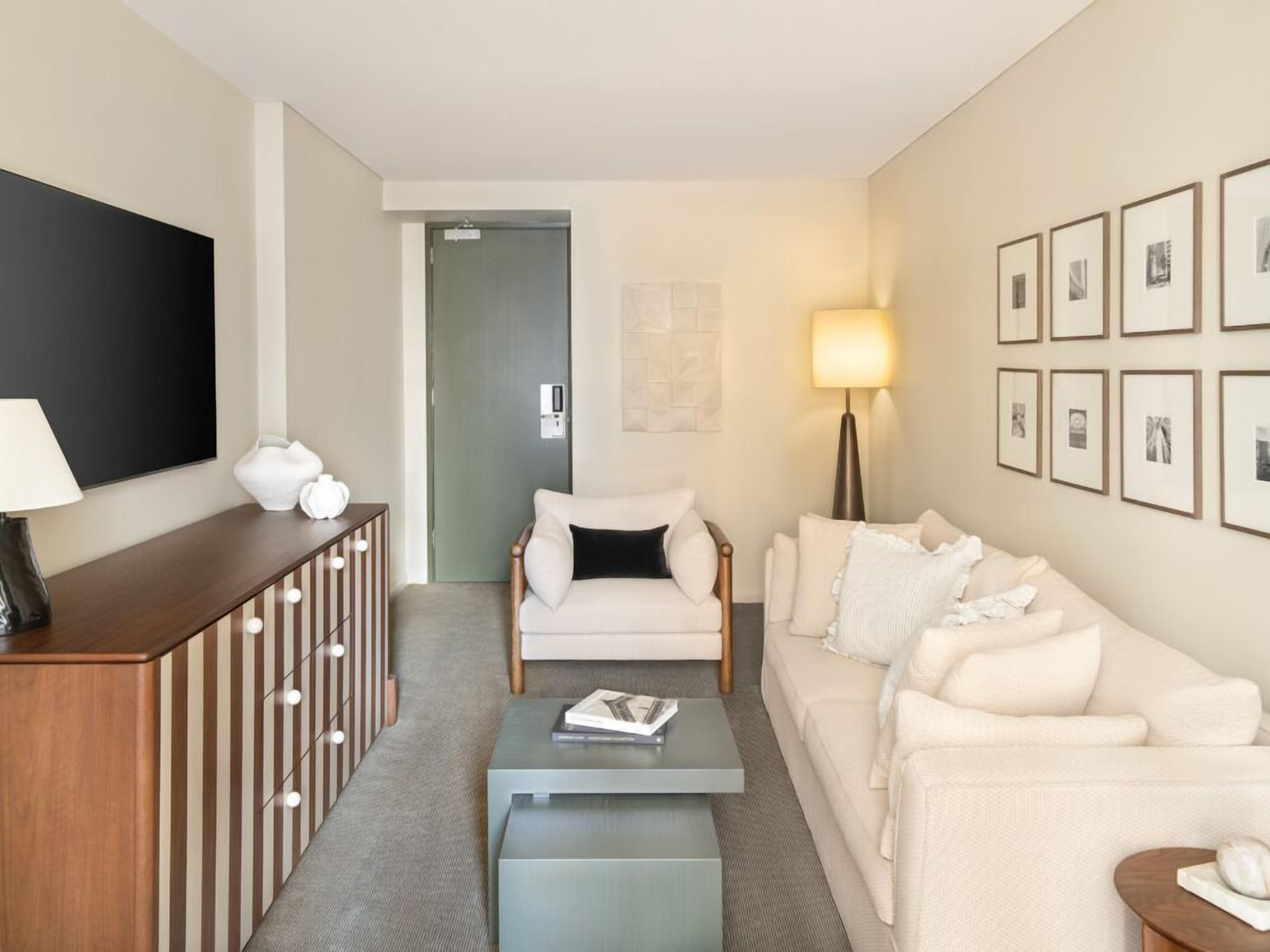 junior suite, 1 king bed | living room | ipod dock