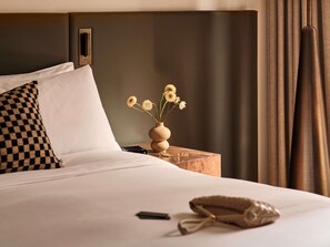 Ropa de cama de alta calidad y minibar 