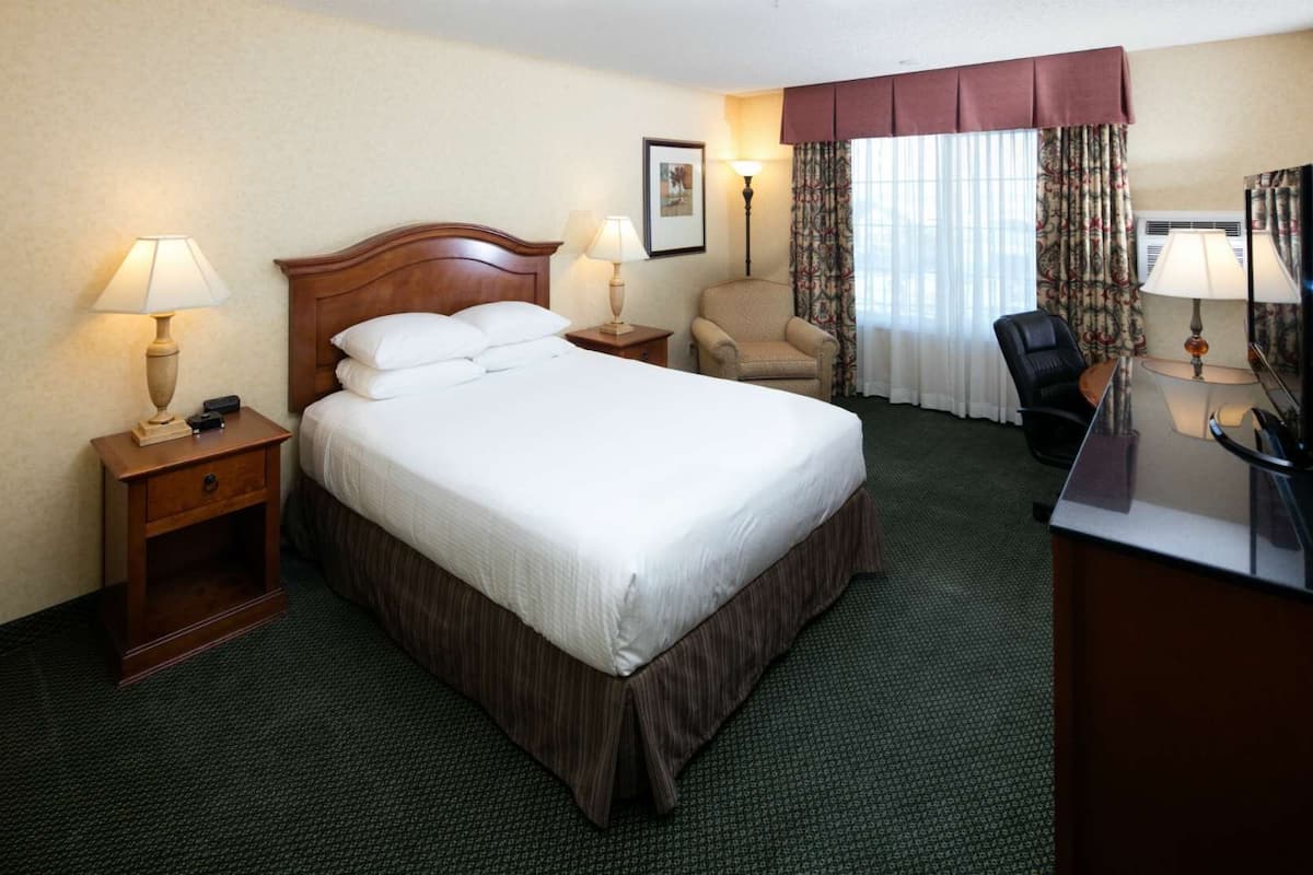 In-room safe, desk, blackout curtains, iron/ironing board