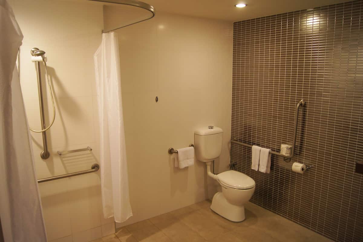 superior room, 1 king bed, accessible | bathroom | shower, designer toiletries, hair dryer, bathrobes
