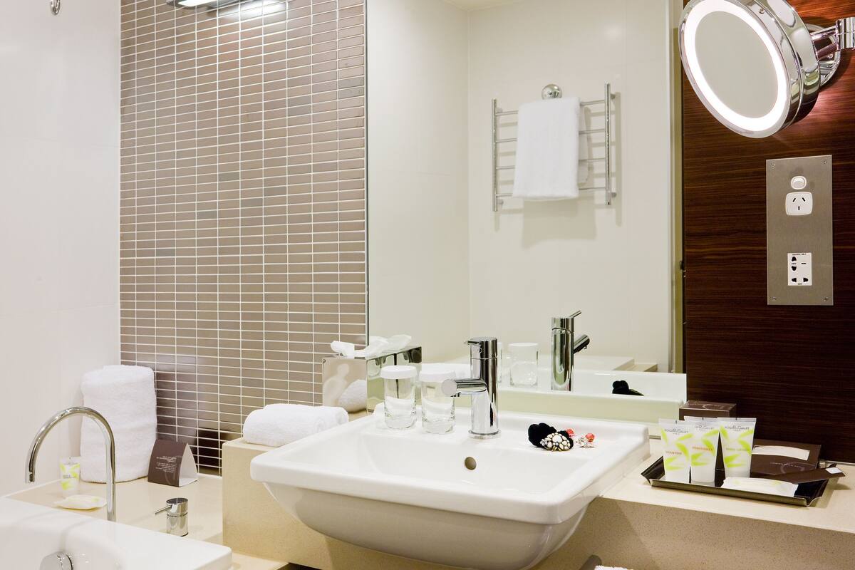 shower, designer toiletries, hair dryer, bathrobes