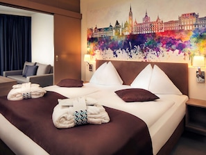 Hypo-allergenic bedding, in-room safe, desk, laptop workspace