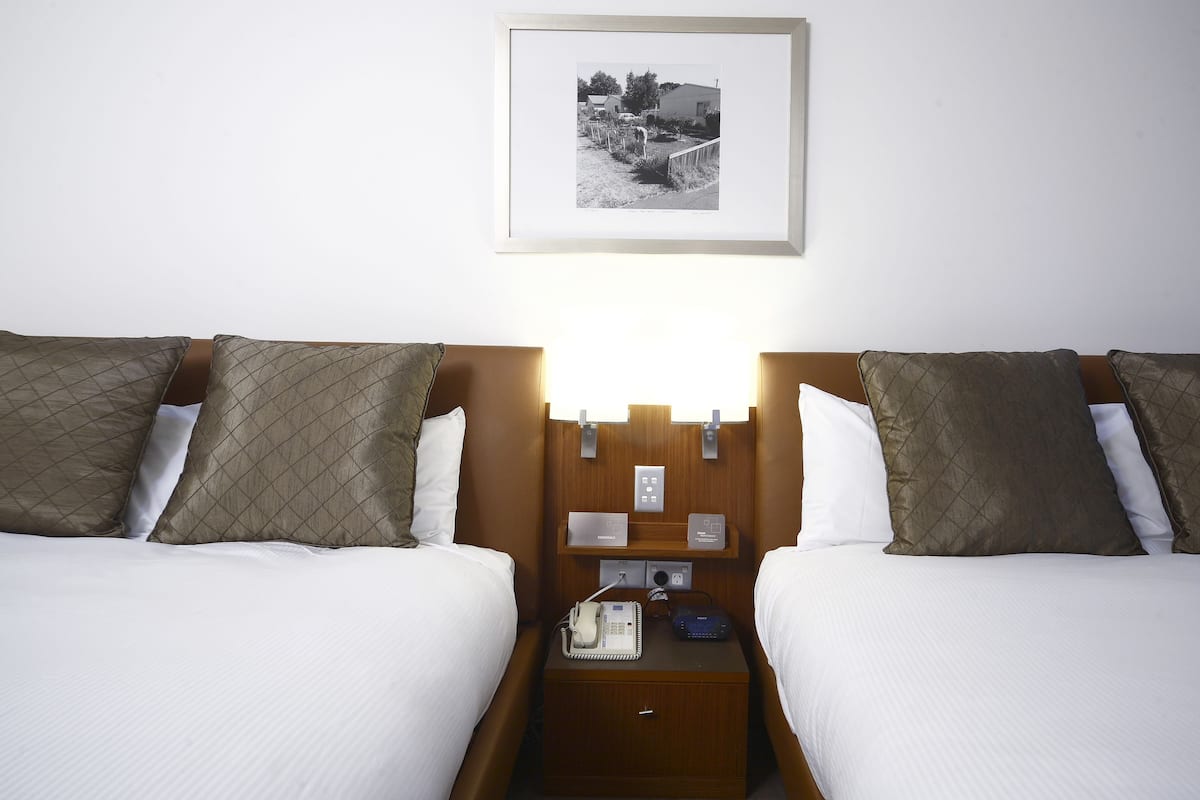Standaard kamer, 2 tweepersoonsbedden | 1 slaapkamer, een kluis op de kamer, individueel gemeubileerd