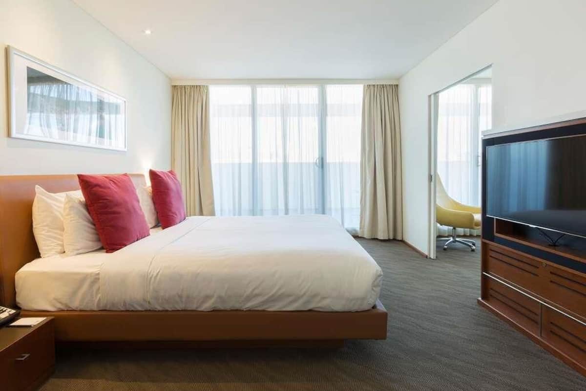 Suite, 1 King Bed, Balcony | In-room safe, individually furnished, desk, laptop workspace