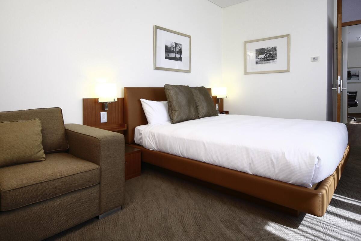 Apartament, 1 dormitori | Caixa forta a l'habitació i escriptori 